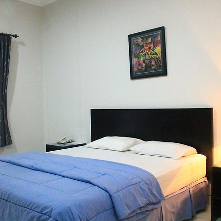 Carica Homestay Сурабая Экстерьер фото