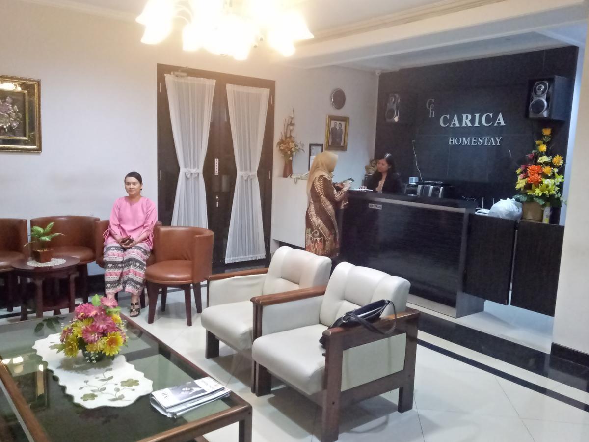 Carica Homestay Сурабая Экстерьер фото